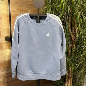 Adidas light blue crew neck sweatshirt with white stripes on sleeves. XL